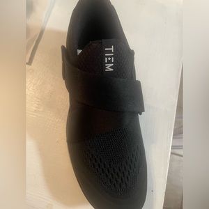 Never worn! Size 8.5 Women’s Tiem spin shoes